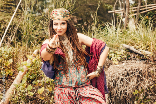 gypsy style young woman outdoors photo