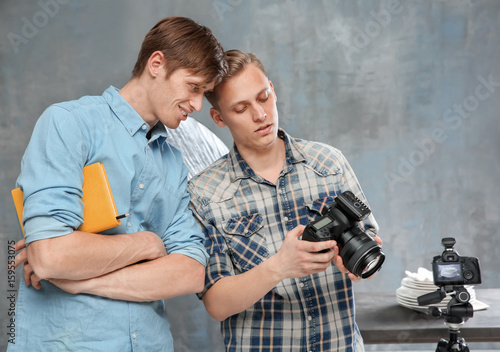Young men looking at camera...