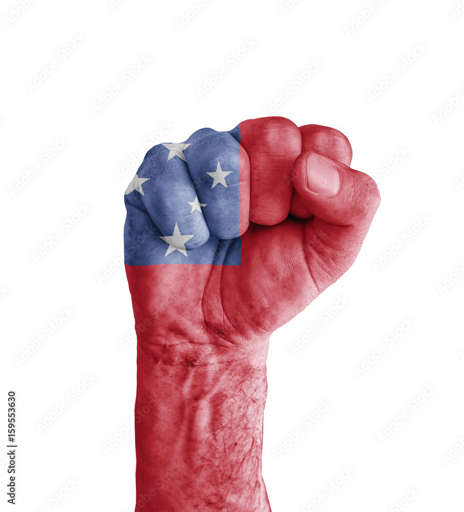 Fototapeta premium Flag of Samoa painted on human fist like victory symbol