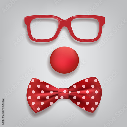 Clown accessories isolated on gray background. Vector clown glasses, nose and bow tie polka dot.