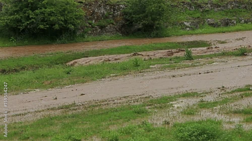 Natural water flood, deluge, inundation, floodwaters, overflow, spate. Global warming and climate change Natural water flood, deluge, inundation, floodwaters, overflow, spate. Global warming and climate change