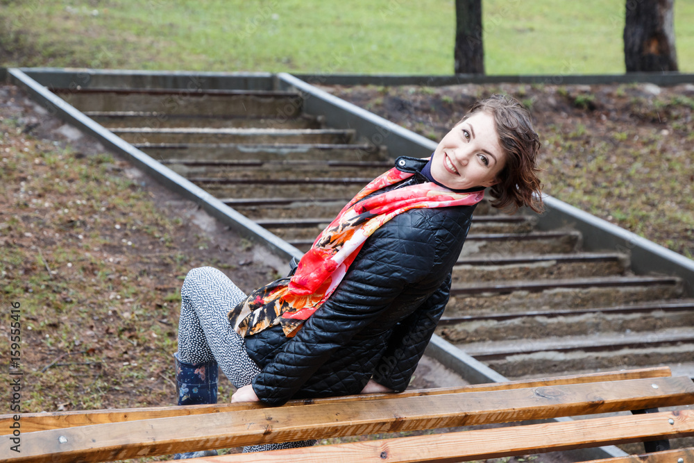 Funny beautiful girl do physical exercises in the Park Funny beautiful girl do physical exercises in the Park