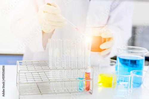 scientist hand holding laboratory test tube  science laboratory research and development concept