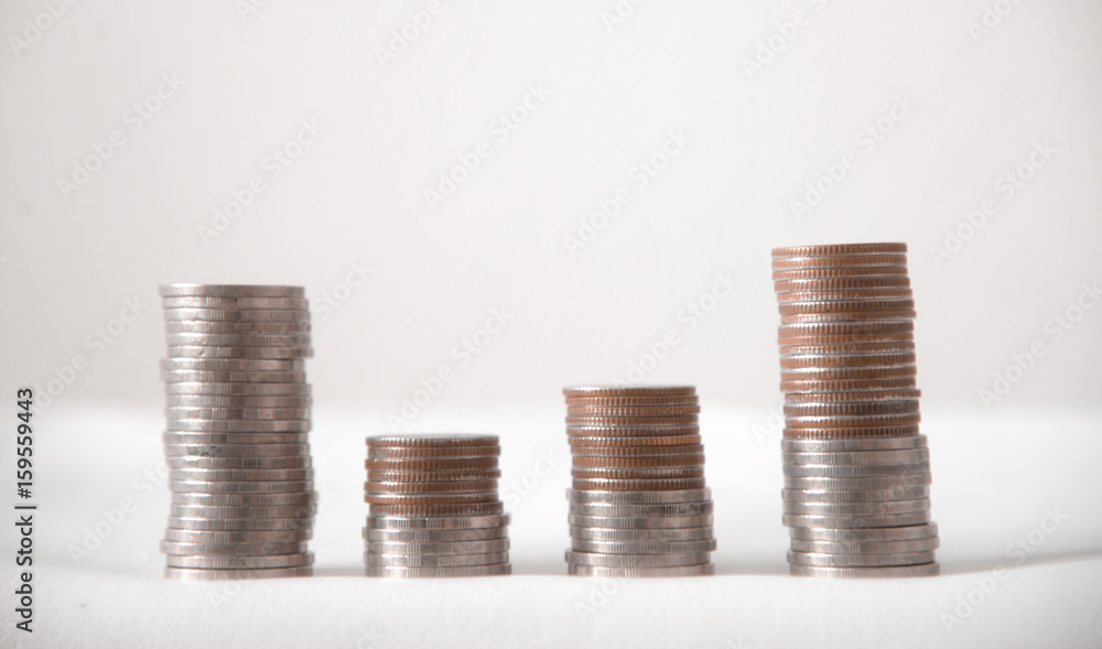 coin showing graph in business concept. coin showing graph in business concept.