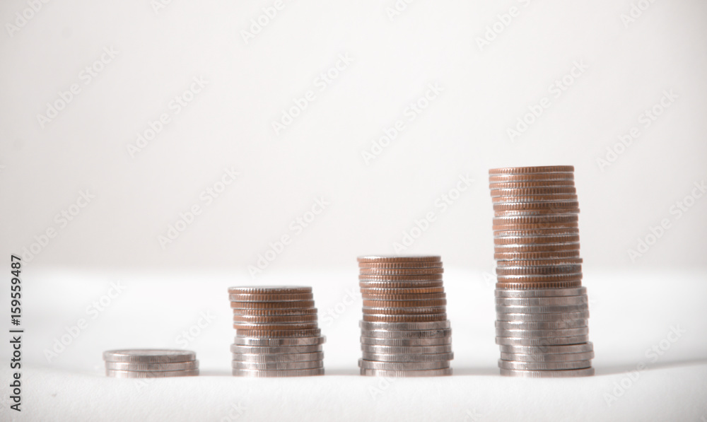 coin showing graph in business concept. coin showing graph in business concept.