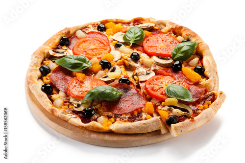 Pizza pepperoni with tomatoes, mushrooms and olives
