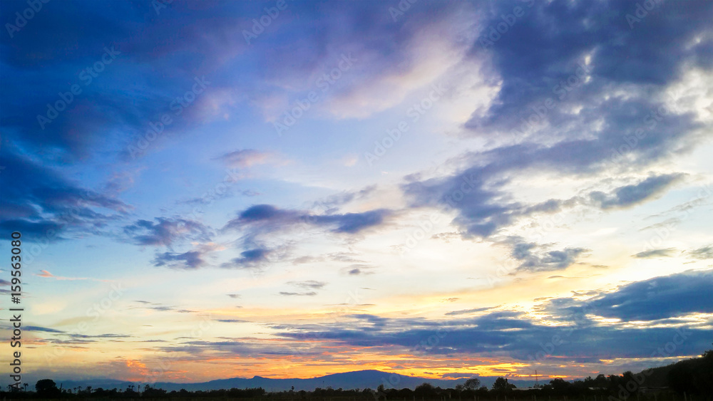 Blue sky with clouds and sunset background Blue sky with clouds and sunset background