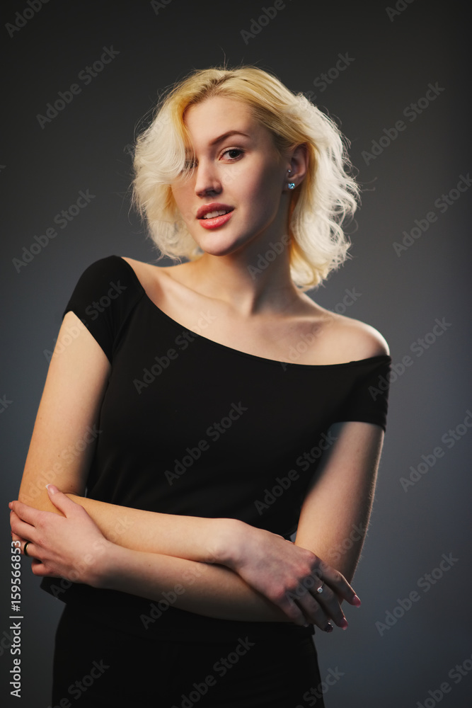 Fototapeta premium beautiful blonde girl posing in studio