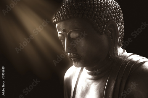calm buddha with light of wisdom, peacful asian buddha zen tao religion art style statue.