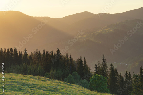 Mountain valley during sundown. Beautiful natural landscape in the summer time