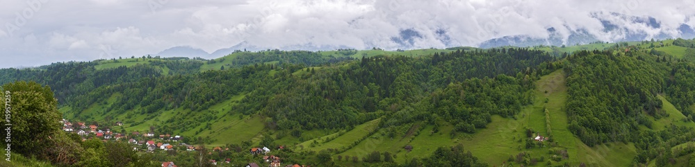 Panorama with mountain scenery in Romania, Carpathian Mountains.