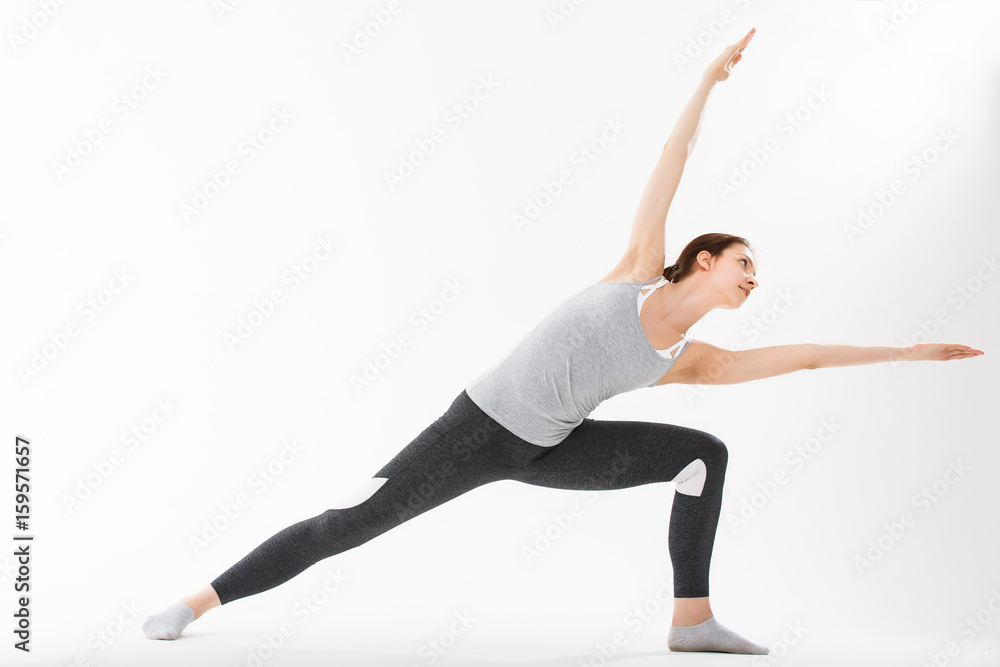 Young woman exercise yoga supported headstand Young woman exercise yoga supported headstand