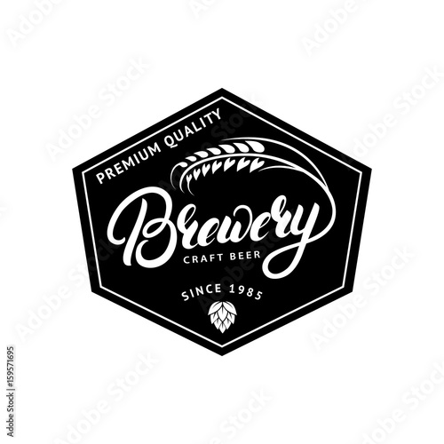 Brewery hand drawn lettering logo, label, badge, emblem with ear of wheat.