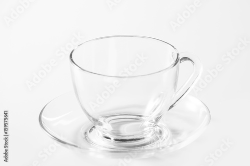 Transparent cup on a white table.