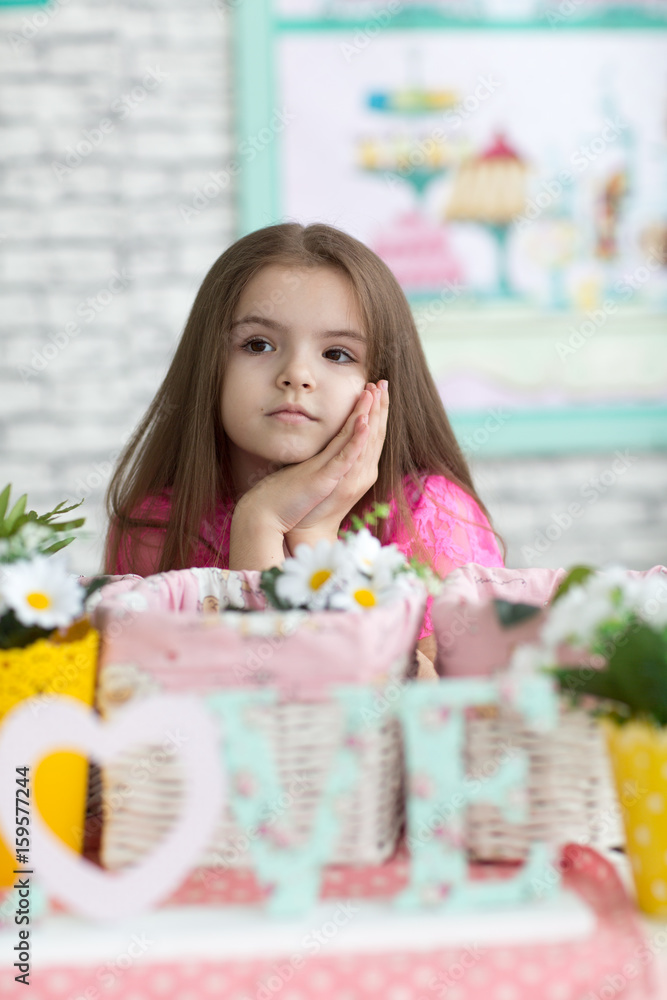 Pretty girl in pink dress in studio Pretty girl in pink dress in studio
