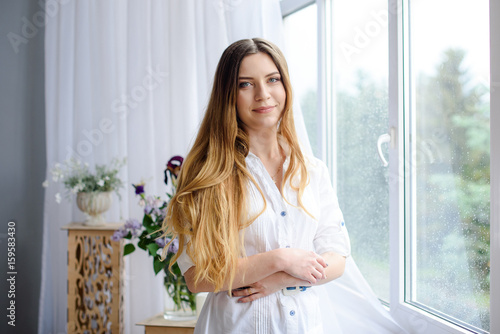 Beauty girl smile looking at camera at home Free Download Beauty girl smile looking at camera at home - GFXLoad