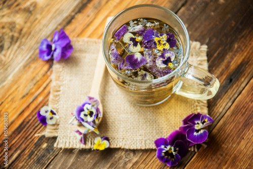 herbal tea on a white wooden background