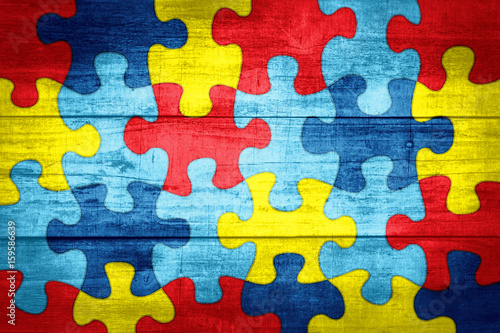 Fototapeta Naklejka Na Ścianę i Meble -  Puzzle Pieces in Autism Awareness Colors Background Illustration
