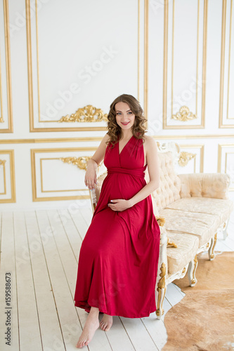 Pregnant woman in red