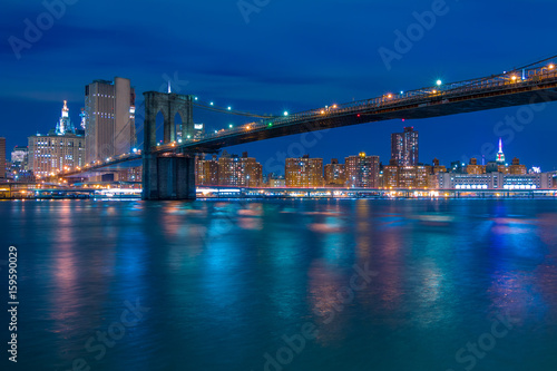Brooklyn Bridge and Night Embankment of Manhattan