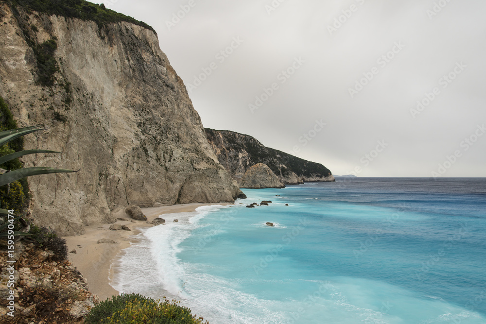 Beach on Cape Lefkatas with turquoise colored water