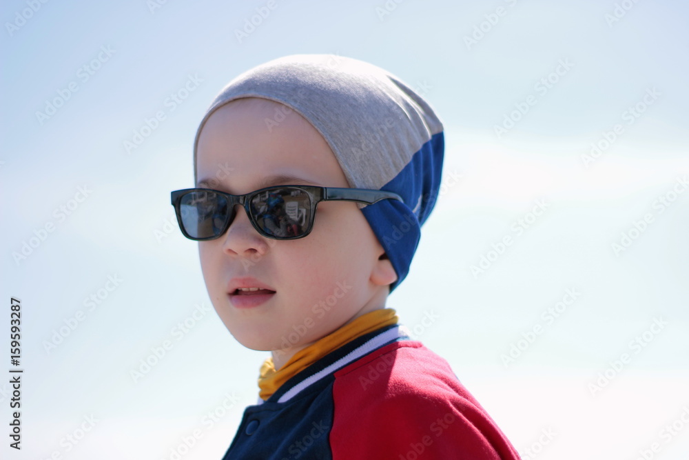Happy child on summer vacation. Travel and adventure concept Happy child on summer vacation. Travel and adventure concept