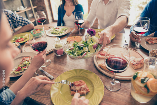 Canvas Print Close up cropped photo of nicely served wooden table with tasty dishes and glasses of red wine