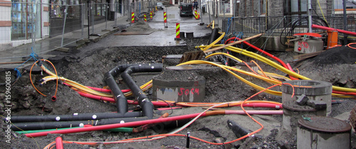 Repair of communications. Water supply, sewerage electrician. Excavated road in the city.
