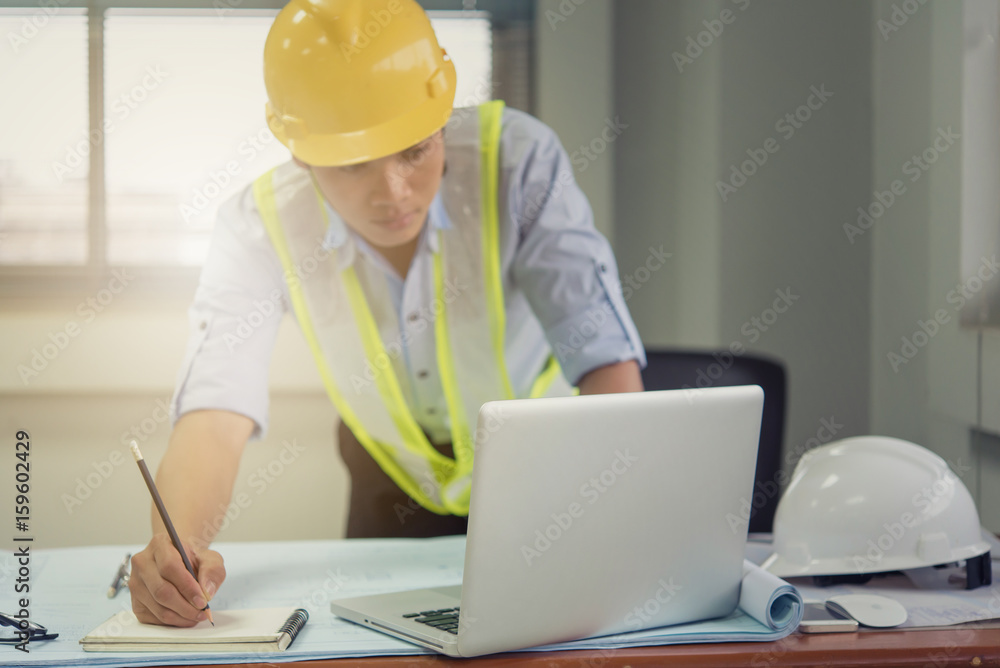 architect man working with laptop and blueprints,engineer inspection in workplace for architectural plan,sketching a construction project ,selective focus,Business concept architect man working with laptop and blueprints,engineer inspection in workplace for architectural plan,sketching a construction project ,selective focus,Business concept