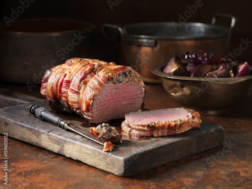 Venison Joint with Mushroom Duxelle and Streaky Bacon photo