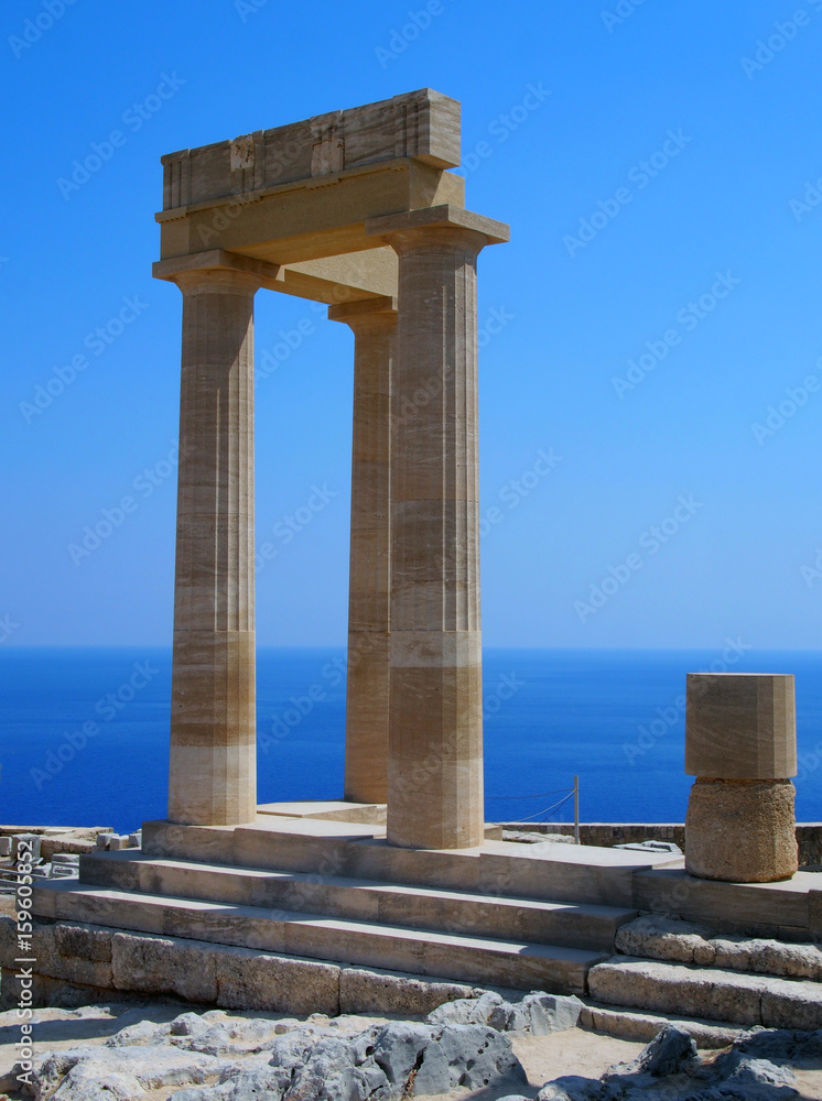 the acropolis in lindos rhodes with blue sky and sea in summer