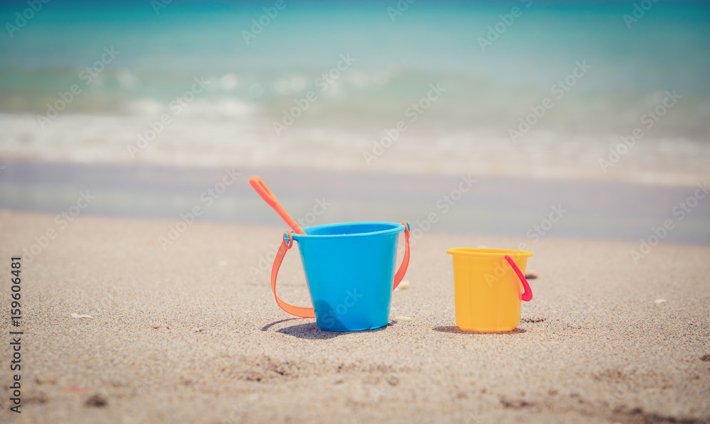 kid toys on tropical sand beach kid toys on tropical sand beach