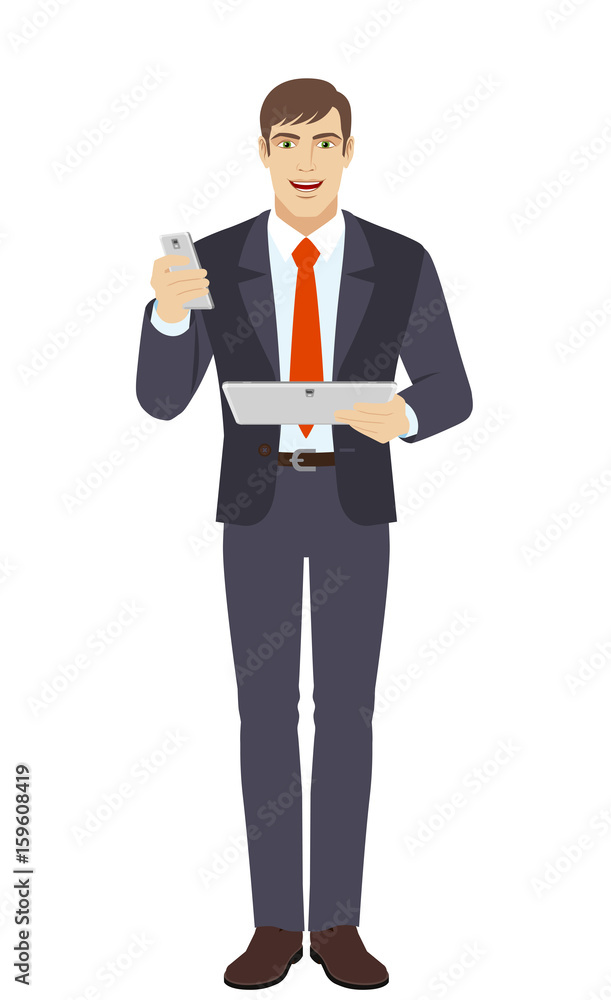 Businessman with mobile phone holding digital tablet PC Businessman with mobile phone holding digital tablet PC