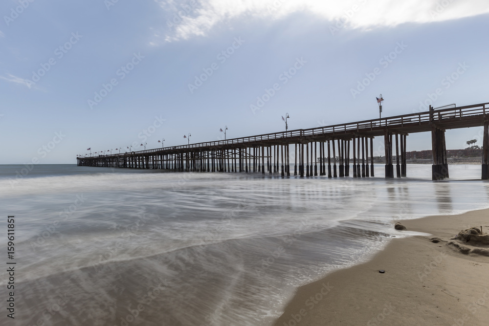 Ventura beach and pier with motion blur water in California.  