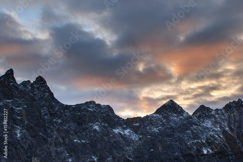 Sunset over rocky peaks