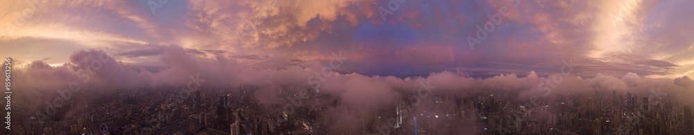 Panorama of sunset with city view by aerial photography. Panorama of sunset with city view by aerial photography.