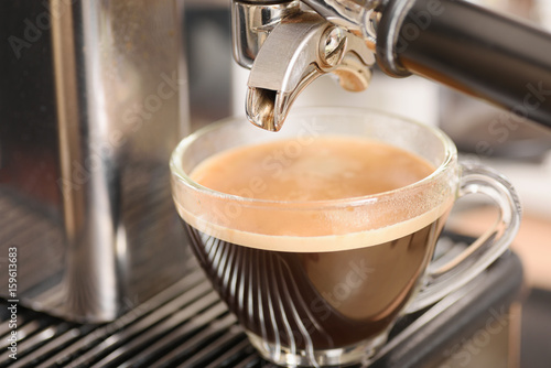 Hot coffee in a cup made from espresso machine