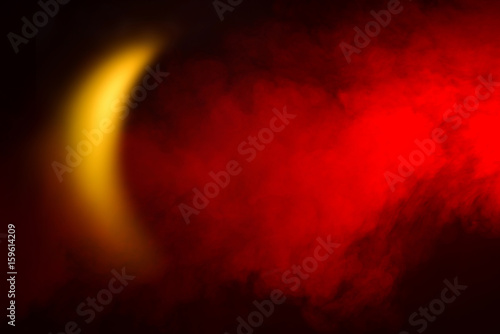 Canvas Print Red smoke and crescent-shaped light. Concept, an Islamic symbol.