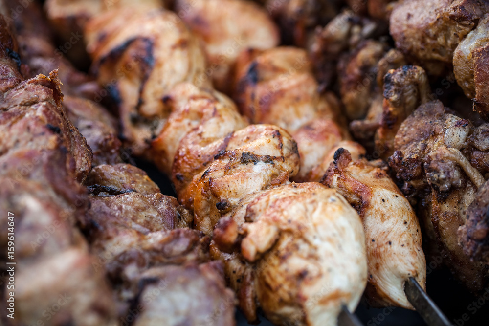 Food at the festival of street food, sausages, hot dog, fried potatoes, shish kebab, fried meat, fried corn and various drinks Food at the festival of street food, sausages, hot dog, fried potatoes, shish kebab, fried meat, fried corn and various drinks