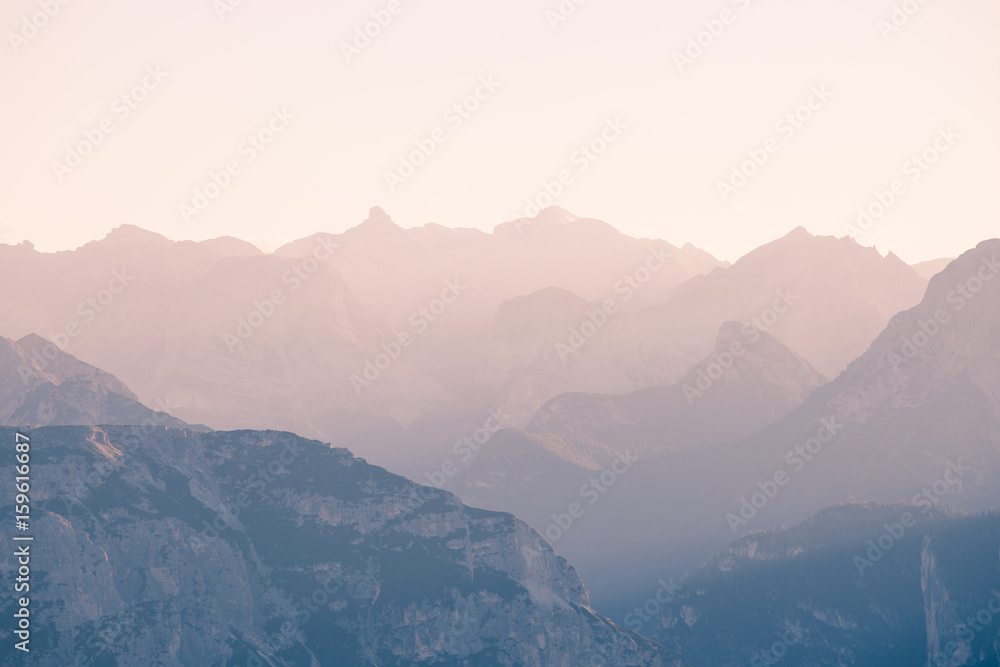 Obraz premium High mountains silhouette at sunset