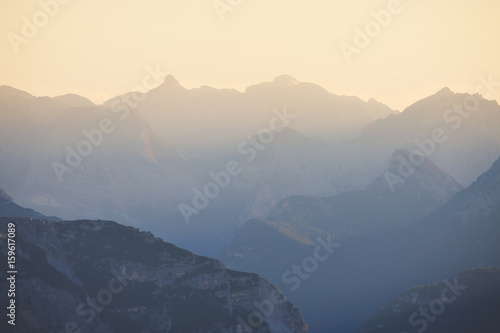 Fototapeta Naklejka Na Ścianę i Meble -  High mountains silhouette at sunset