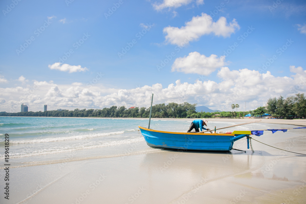 Colorful fishing boat on the beach