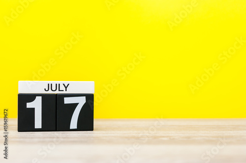 July 17th. Image of july 17, calendar on yellow background. Summer time. With empty space for text