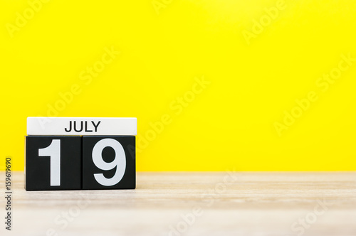 July 19th. Image of july 19, calendar on yellow background. Summer time. With empty space for text