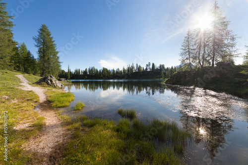 Alpine mountain summer lake at sunny day