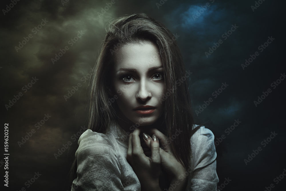 Dark portrait of mysterious woman