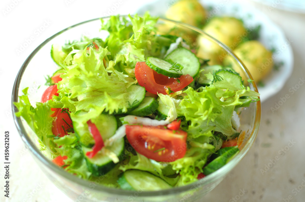 fresh vegetable salad with tomato, cucumber and salad frisee fresh vegetable salad with tomato, cucumber and salad frisee