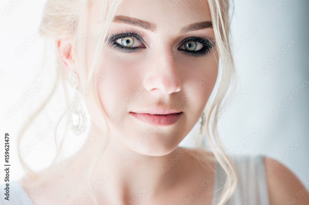 Fashion bride in gray dress with make-up smoky eyes Fashion bride in gray dress with make-up smoky eyes