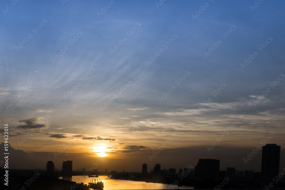 The silhouette of Bangkok city and Chaophraya river