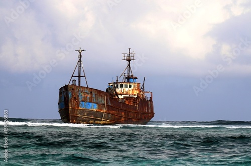 Boat stranded on reef